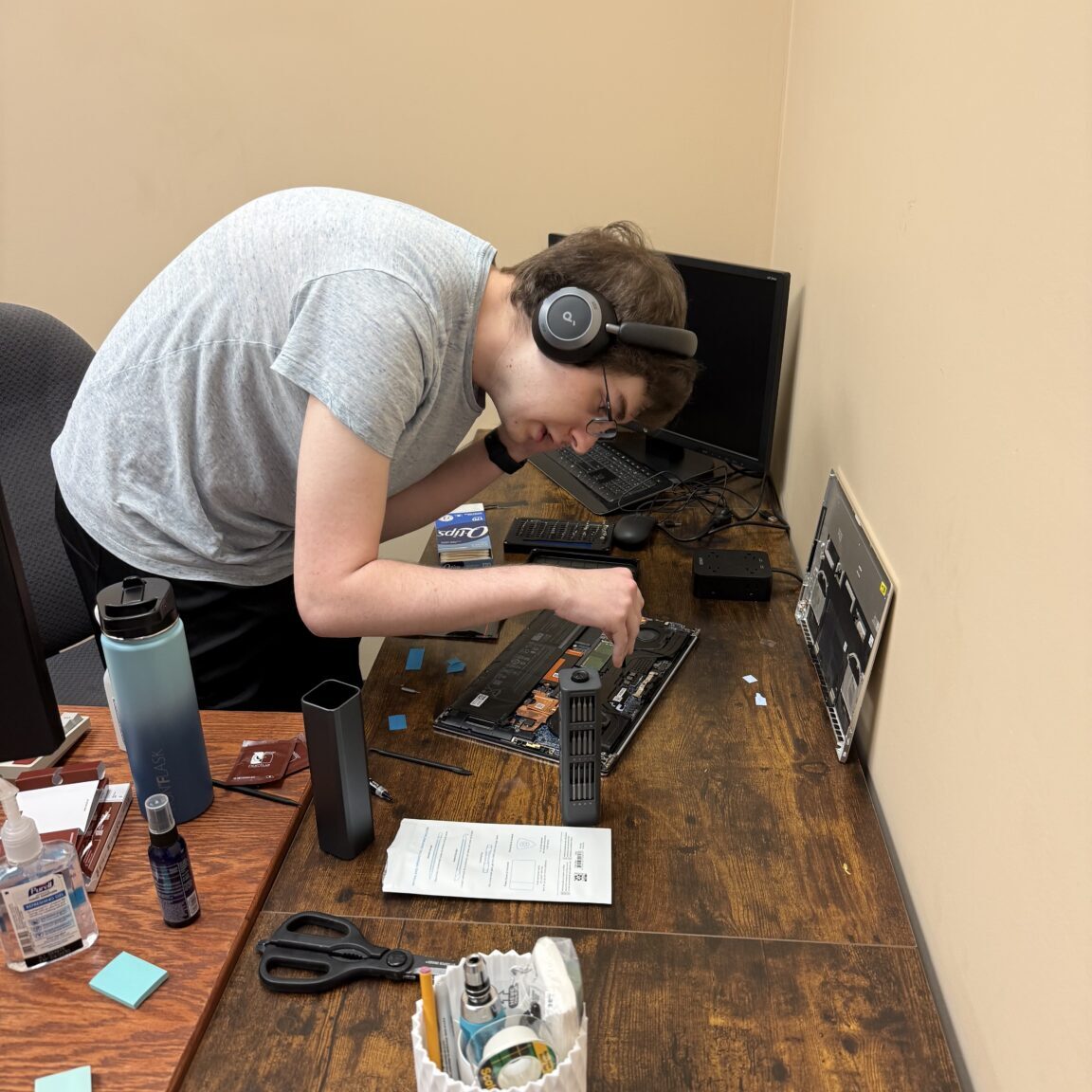Nate working on a laptop